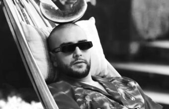 Moroccan rapper Draganove wearing dark sunglasses — artist and producer from Oujda