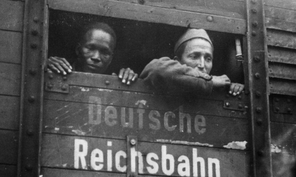 Moroccan and French soldiers captured during World War II on a train to Germany