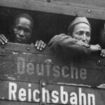 Moroccan and French soldiers captured during World War II on a train to Germany