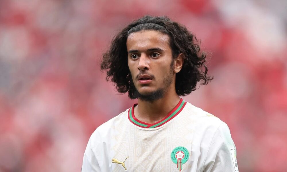 Ayyoub Bouaddi warms up for Lille amid reports of a move to Manchester City.