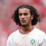 Ayyoub Bouaddi warms up for Lille amid reports of a move to Manchester City.