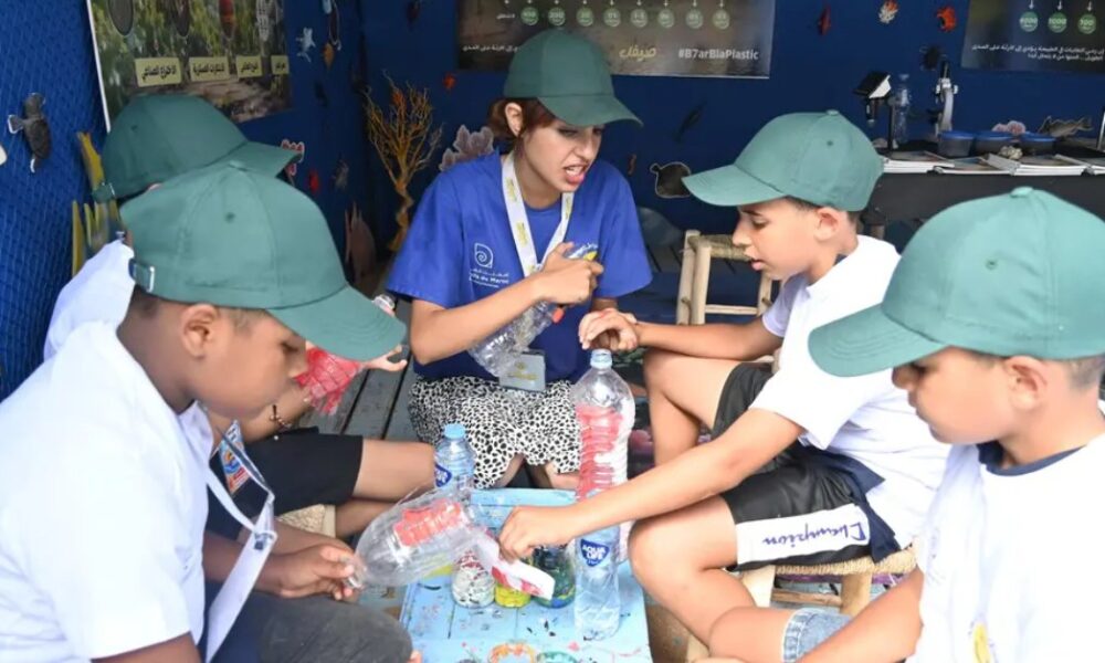 Morocco's first AI-powered eco-village teaches children about plastic pollution on the beach in Safi