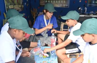 Morocco's first AI-powered eco-village teaches children about plastic pollution on the beach in Safi