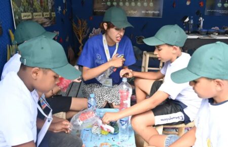 Morocco's first AI-powered eco-village teaches children about plastic pollution on the beach in Safi