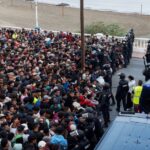 Police clear migrants from beaches in Occupied Ceuta as shelter remains limited.
